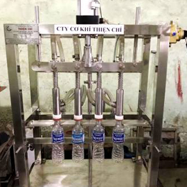 Máy chiết rót 4 vòi bán tự động